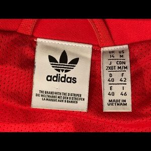 adidas cropped zip-up jacket.